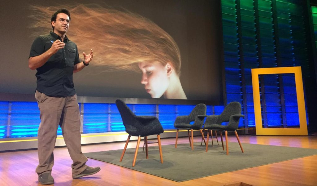 Kike Calvo speaking at a National Geographic event